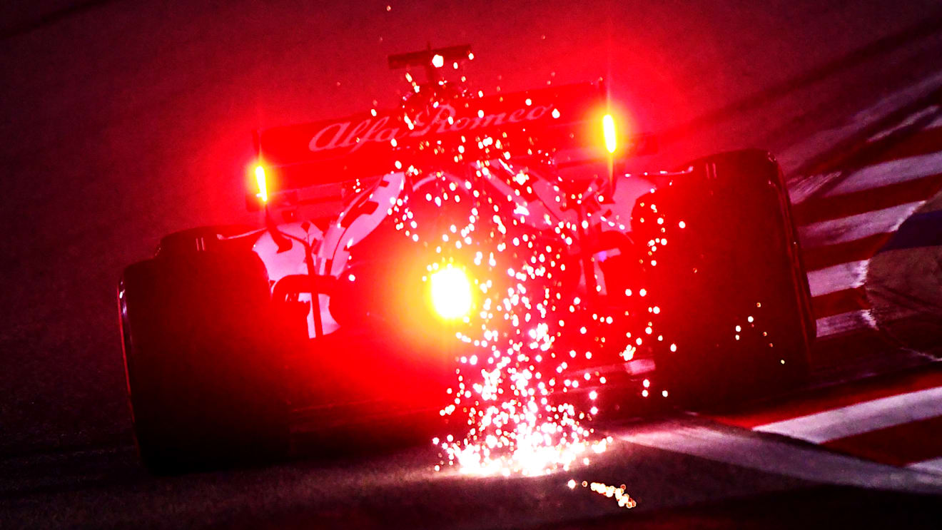 BAHRAIN, BAHRAIN - DECEMBER 04: Sparks fly behind Kimi Raikkonen of Finland driving the (7) Alfa Romeo Racing C39 Ferrari during practice ahead of the F1 Grand Prix of Sakhir at Bahrain International Circuit on December 04, 2020 in Bahrain, Bahrain. (Photo by Mario Renzi - Formula 1/Formula 1 via Getty Images)