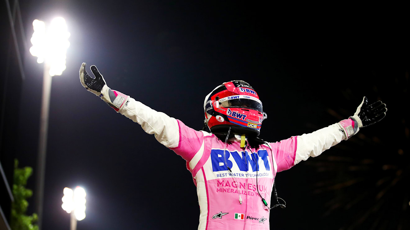 BAHRAIN, BAHRAIN - DECEMBER 06: Race winner Sergio Perez of Mexico and Racing Point celebrates in parc ferme during the F1 Grand Prix of Sakhir at Bahrain International Circuit on December 06, 2020 in Bahrain, Bahrain. (Photo by Bryn Lennon/Getty Images)