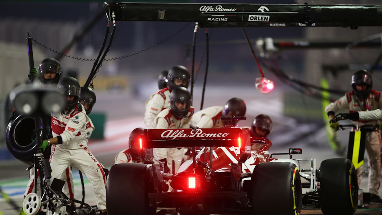 BAHRAIN, BAHRAIN - DECEMBER 06: Kimi Raikkonen of Finland driving the (7) Alfa Romeo Racing C39 Ferrari makes a pitstop during the F1 Grand Prix of Sakhir at Bahrain International Circuit on December 06, 2020 in Bahrain, Bahrain. (Photo by Peter Fox/Getty Images)
