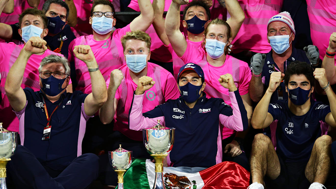 BAHRAIN, BAHRAIN - DECEMBER 06: Race winner Sergio Perez of Mexico and Racing Point, third placed Lance Stroll of Canada and Racing Point and Otmar Szafnauer, Team Principal and Chief Executive Officer of Racing Point celebrate with their team in the Pitlane after the F1 Grand Prix of Sakhir at Bahrain International Circuit on December 06, 2020 in Bahrain, Bahrain. (Photo by Peter Fox/Getty Images)
