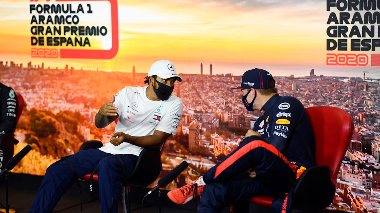 BARCELONA, SPAIN - AUGUST 15: Third placed qualifier Max Verstappen of Netherlands and Red Bull Racing and pole position qualifier Lewis Hamilton of Great Britain and Mercedes GP talk in the Drivers Press Conference during qualifying for the F1 Grand Prix of Spain at Circuit de Barcelona-Catalunya on August 15, 2020 in Barcelona, Spain. (Photo by Rudy Carezzevoli/Getty Images)