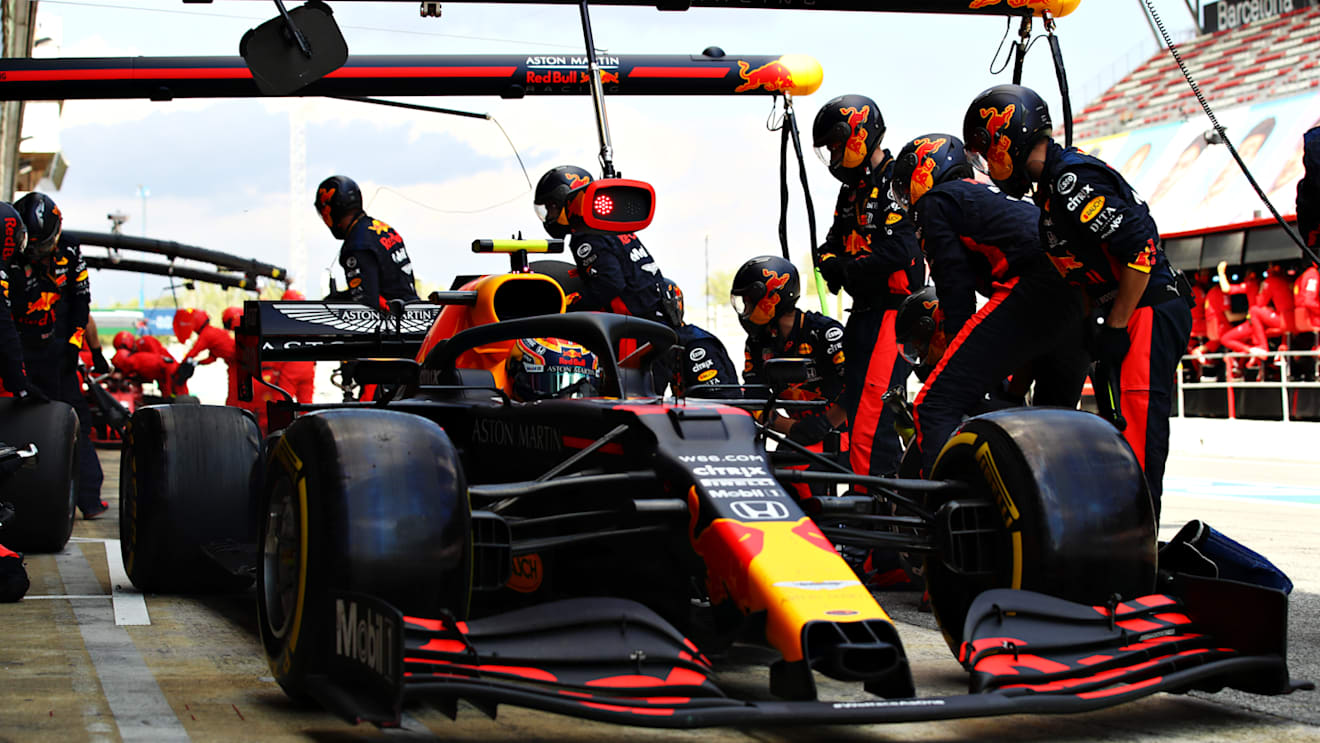 BARCELONA, SPAIN - AUGUST 16: Alexander Albon of Thailand driving the (23) Aston Martin Red Bull Racing RB16 makes a pitstop during the F1 Grand Prix of Spain at Circuit de Barcelona-Catalunya on August 16, 2020 in Barcelona, Spain. (Photo by Mark Thompson/Getty Images)