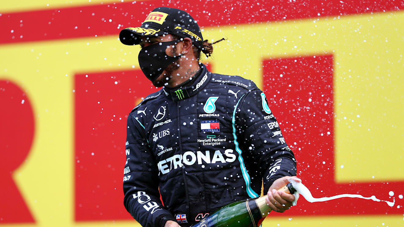 SPIELBERG, AUSTRIA - JULY 12: Lewis Hamilton of Great Britain and Mercedes GP celebrates on the podium after winning the Formula One Grand Prix of Styria at Red Bull Ring on July 12, 2020 in Spielberg, Austria. (Photo by Dan Istitene - Formula 1/Formula 1 via Getty Images)