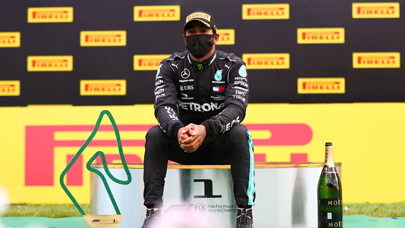 SPIELBERG, AUSTRIA - JULY 12: Race winner Lewis Hamilton of Great Britain and Mercedes GP celebrates on the podium during the Formula One Grand Prix of Styria at Red Bull Ring on July 12, 2020 in Spielberg, Austria. (Photo by Dan Istitene - Formula 1/Formula 1 via Getty Images)