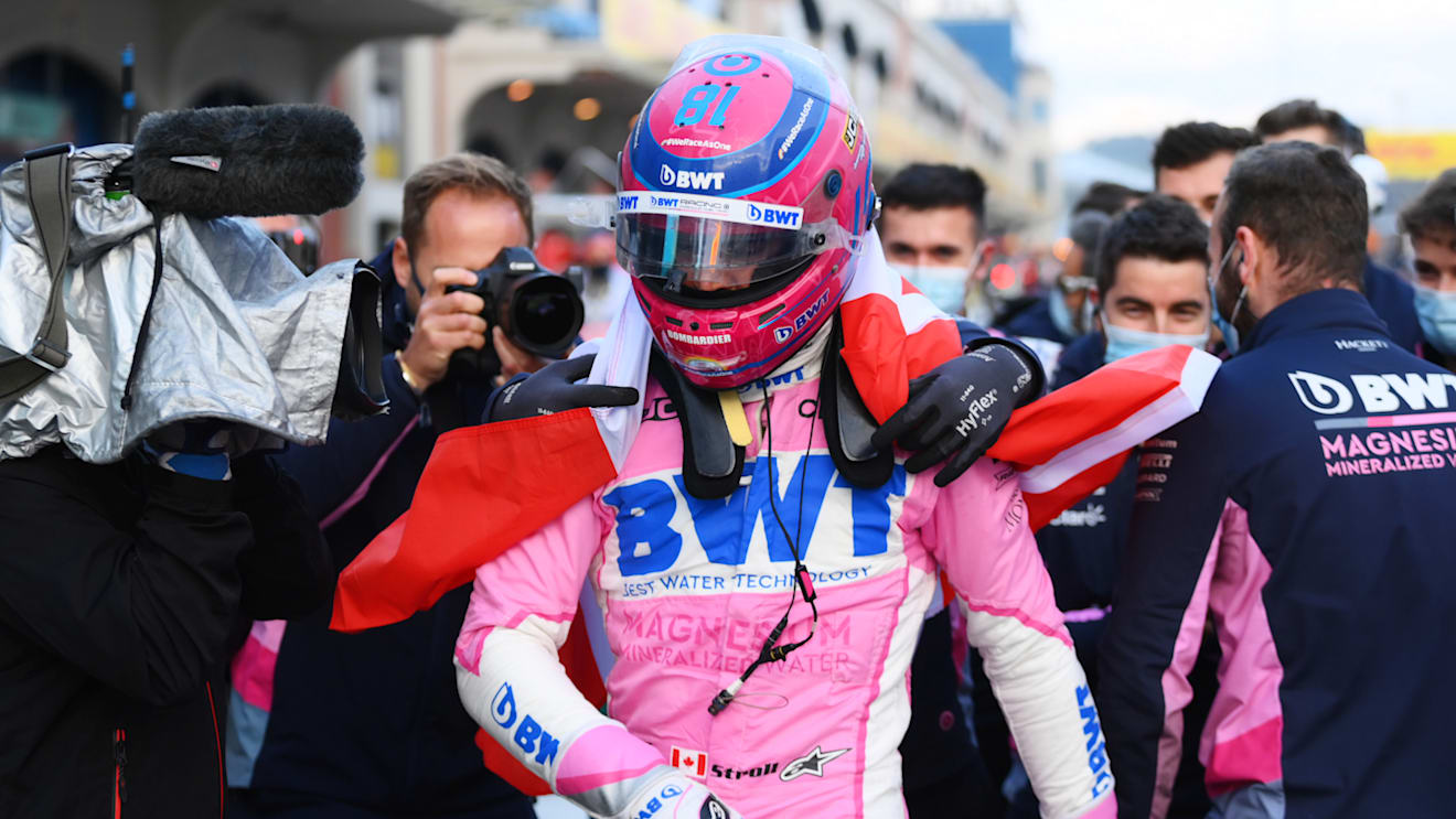 ISTANBUL, TURKEY - NOVEMBER 14: Pole position qualifier Lance Stroll of Canada and Racing Point celebrates with team members in parc ferme during qualifying ahead of the F1 Grand Prix of Turkey at Intercity Istanbul Park on November 14, 2020 in Istanbul, Turkey. (Photo by Clive Mason/Getty Images)