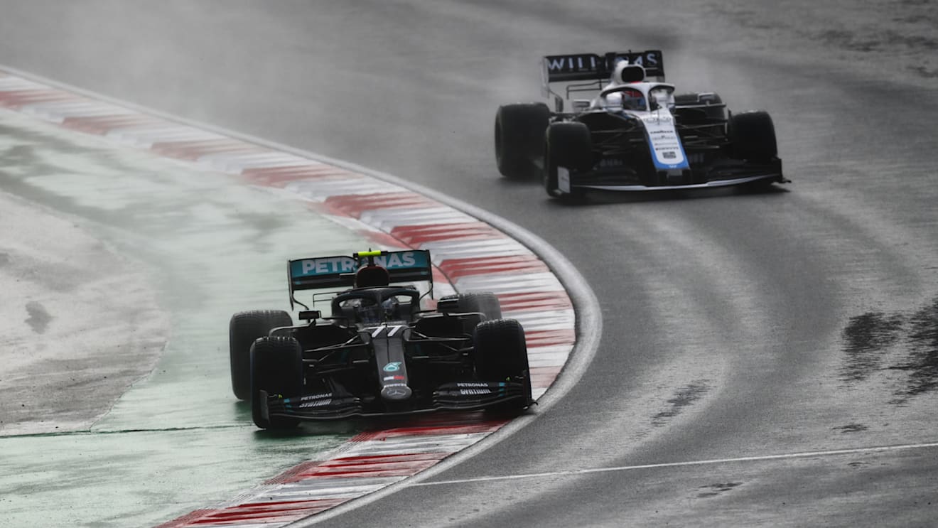 ISTANBUL, TURKEY - NOVEMBER 15: Valtteri Bottas of Finland driving the (77) Mercedes AMG Petronas F1 Team Mercedes W11 leads George Russell of Great Britain driving the (63) Williams Racing FW43 Mercedes during the F1 Grand Prix of Turkey at Intercity Istanbul Park on November 15, 2020 in Istanbul, Turkey. (Photo by Clive Mason/Getty Images)