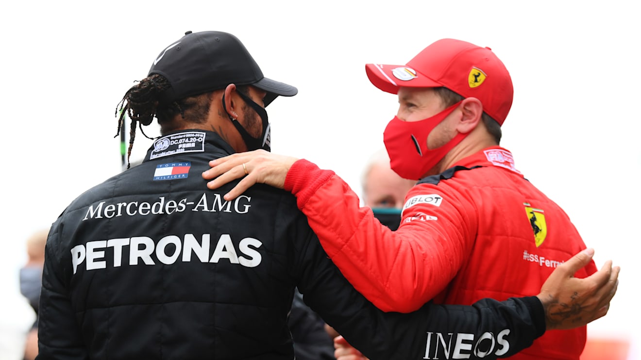 ISTANBUL, TURKEY - NOVEMBER 15: Race winner Lewis Hamilton of Great Britain and Mercedes GP celebrates winning a 7th F1 World Drivers Championship with third placed Sebastian Vettel of Germany and Ferrari in parc ferme during the F1 Grand Prix of Turkey at Intercity Istanbul Park on November 15, 2020 in Istanbul, Turkey. (Photo by Clive Mason/Getty Images)