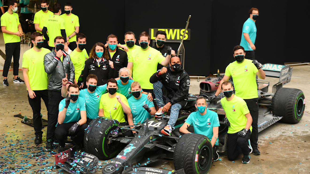 ISTANBUL, TURKEY - NOVEMBER 15: Race winner Lewis Hamilton of Great Britain and Mercedes GP celebrates winning a 7th F1 World Drivers Championship with his team in the Pitlane after the F1 Grand Prix of Turkey at Intercity Istanbul Park on November 15, 2020 in Istanbul, Turkey. (Photo by Clive Mason/Getty Images)