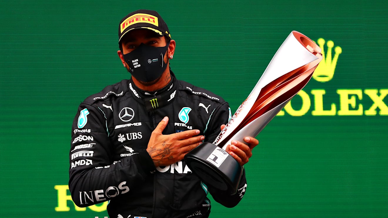 ISTANBUL, TURKEY - NOVEMBER 15: Race winner Lewis Hamilton of Great Britain and Mercedes GP celebrates winning a 7th F1 World Drivers Championship on the podium during the F1 Grand Prix of Turkey at Intercity Istanbul Park on November 15, 2020 in Istanbul, Turkey. (Photo by Dan Istitene - Formula 1/Formula 1 via Getty Images)