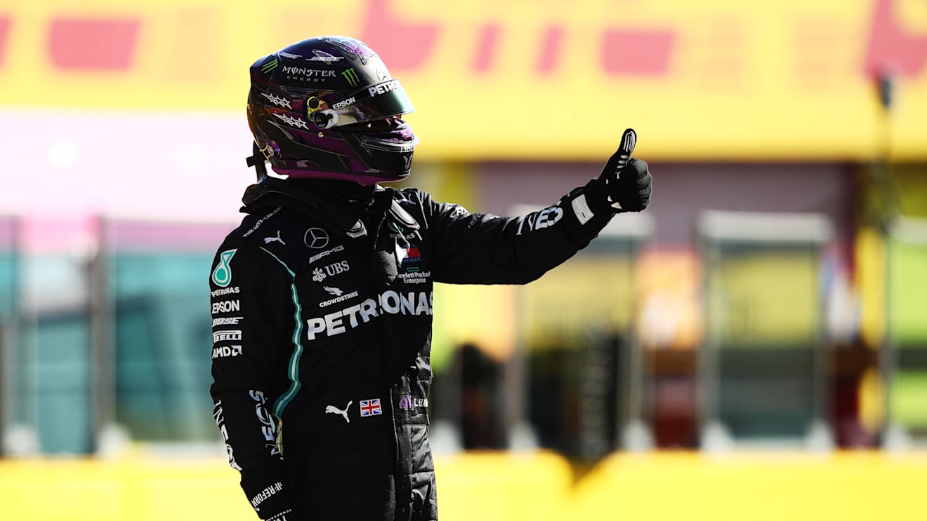 SCARPERIA, ITALY - SEPTEMBER 12: Pole position qualifier Lewis Hamilton of Great Britain and Mercedes GP celebrates in parc ferme during qualifying for the F1 Grand Prix of Tuscany at Mugello Circuit on September 12, 2020 in Scarperia, Italy. (Photo by Bryn Lennon/Getty Images)