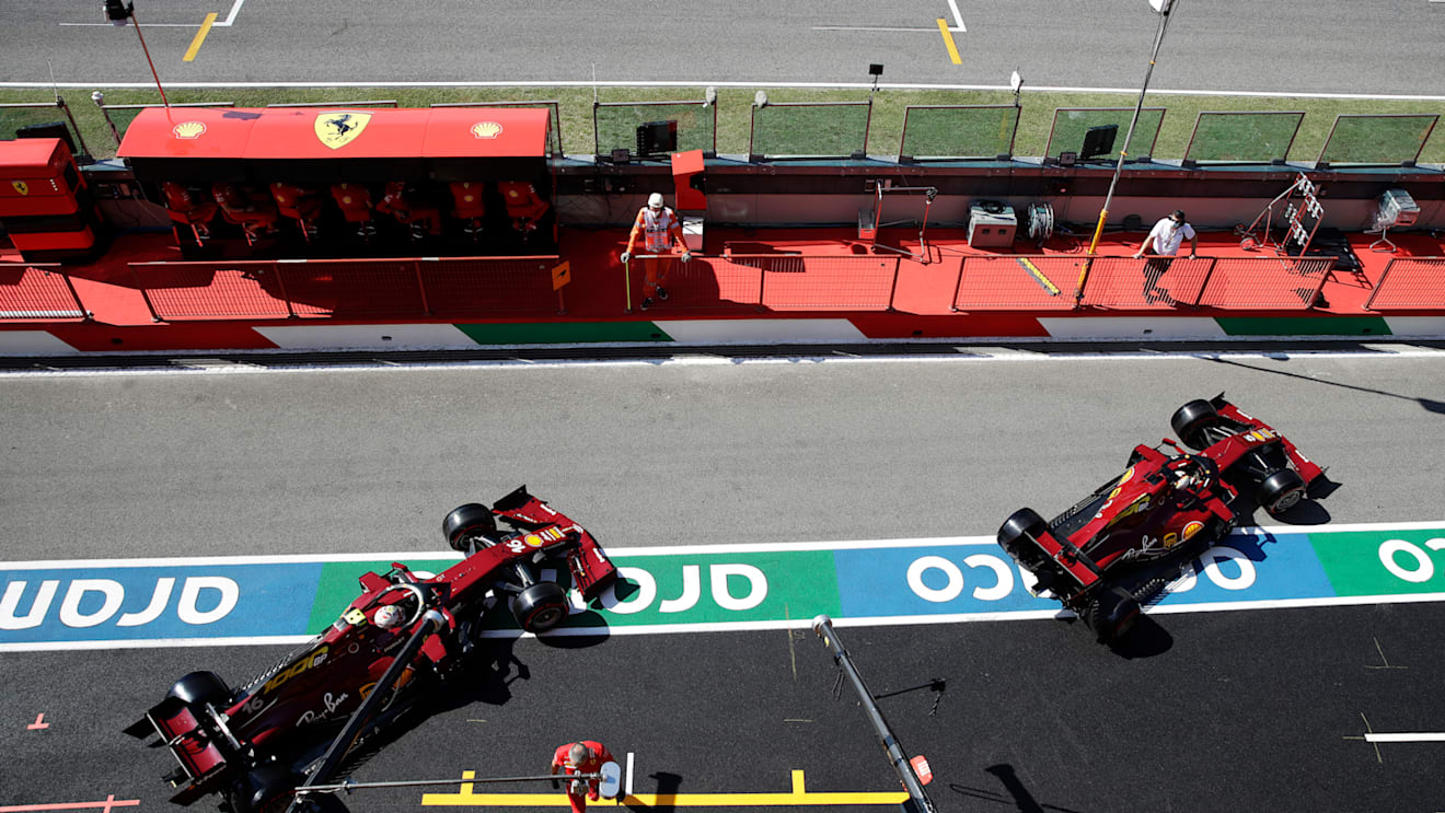 SCARPERIA, ITALY - SEPTEMBER 12: Charles Leclerc of Monaco driving the (16) Scuderia Ferrari SF1000 and Sebastian Vettel of Germany driving the (5) Scuderia Ferrari SF1000 leave the garage during qualifying for the F1 Grand Prix of Tuscany at Mugello Circuit on September 12, 2020 in Scarperia, Italy. (Photo by Luca Bruno - Pool/Getty Images)