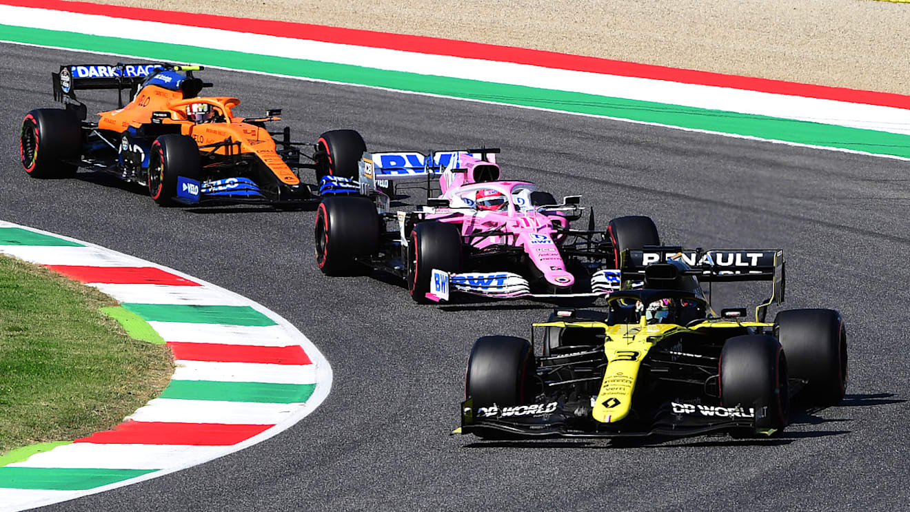 SCARPERIA, ITALY - SEPTEMBER 13: Daniel Ricciardo of Australia driving the (3) Renault Sport Formula One Team RS20 leads Sergio Perez of Mexico driving the (11) Racing Point RP20 Mercedes and Lando Norris of Great Britain driving the (4) McLaren F1 Team MCL35 Renault during the F1 Grand Prix of Tuscany at Mugello Circuit on September 13, 2020 in Scarperia, Italy. (Photo by Jenifer Lorenzini - Pool/Getty Images)