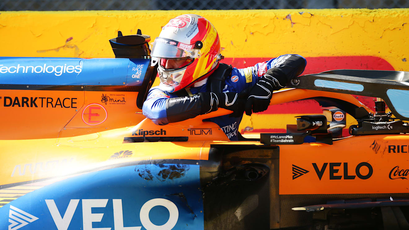 SCARPERIA, ITALY - SEPTEMBER 13: Carlos Sainz of Spain and McLaren F1 climbs out of his car after a collision during the F1 Grand Prix of Tuscany at Mugello Circuit on September 13, 2020 in Scarperia, Italy. (Photo by Peter Fox/Getty Images)