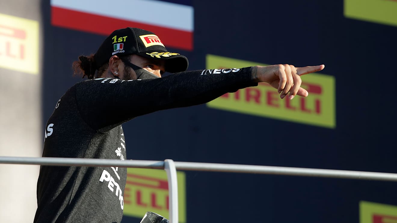SCARPERIA, ITALY - SEPTEMBER 13: Race winner Lewis Hamilton of Great Britain and Mercedes GP celebrates on the podium during the F1 Grand Prix of Tuscany at Mugello Circuit on September 13, 2020 in Scarperia, Italy. (Photo by Luca Bruno - Pool/Getty Images)