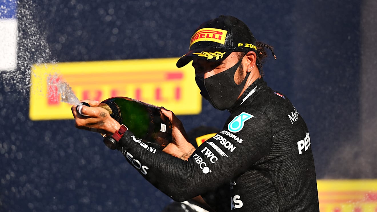 SCARPERIA, ITALY - SEPTEMBER 13: Race winner Lewis Hamilton of Great Britain and Mercedes GP celebrates on the podium during the F1 Grand Prix of Tuscany at Mugello Circuit on September 13, 2020 in Scarperia, Italy. (Photo by Clive Mason - Formula 1/Formula 1 via Getty Images)