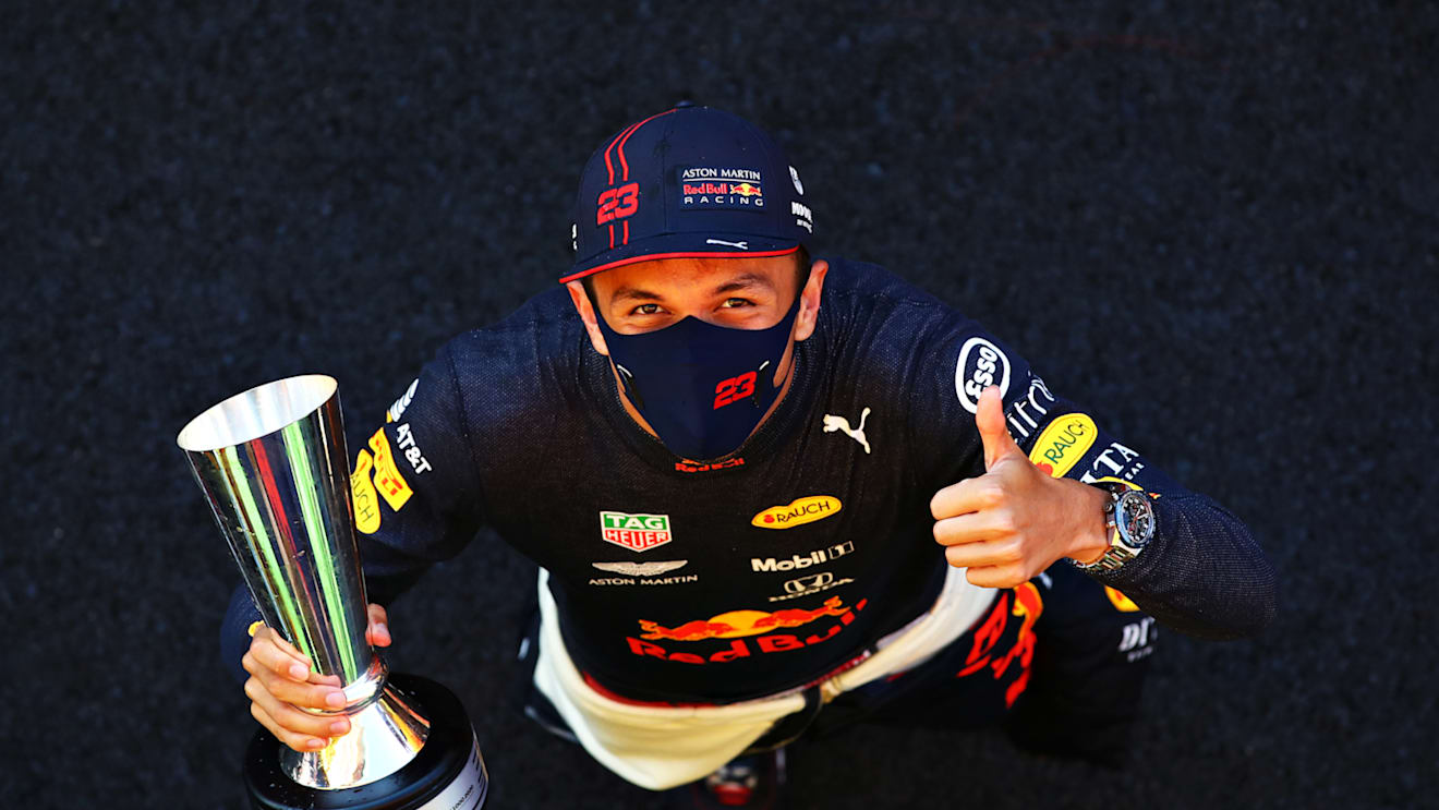 SCARPERIA, ITALY - SEPTEMBER 13: Third placed Alexander Albon of Thailand and Red Bull Racing celebrates after the F1 Grand Prix of Tuscany at Mugello Circuit on September 13, 2020 in Scarperia, Italy. (Photo by Mark Thompson/Getty Images)