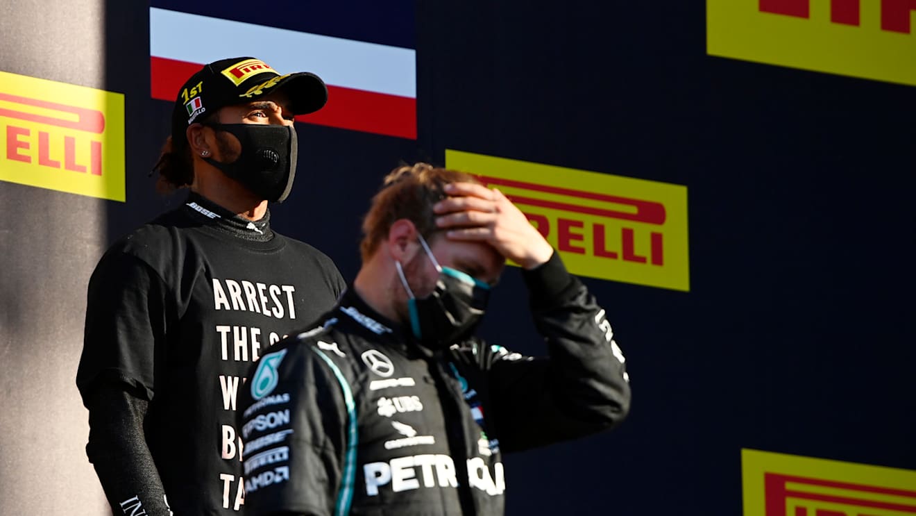 SCARPERIA, ITALY - SEPTEMBER 13: Race winner Lewis Hamilton of Great Britain and Mercedes GP stands on the podium during the F1 Grand Prix of Tuscany at Mugello Circuit on September 13, 2020 in Scarperia, Italy. (Photo by Rudy Carezzevoli/Getty Images)