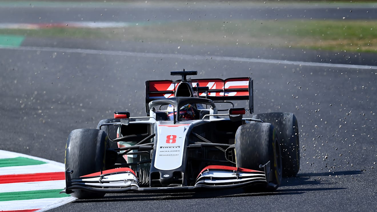 SCARPERIA, ITALY - SEPTEMBER 13: Romain Grosjean of France driving the (8) Haas F1 Team VF-20 Ferrari throws gravel from his tyres after running wide at the start during the F1 Grand Prix of Tuscany at Mugello Circuit on September 13, 2020 in Scarperia, Italy. (Photo by Clive Mason - Formula 1/Formula 1 via Getty Images)