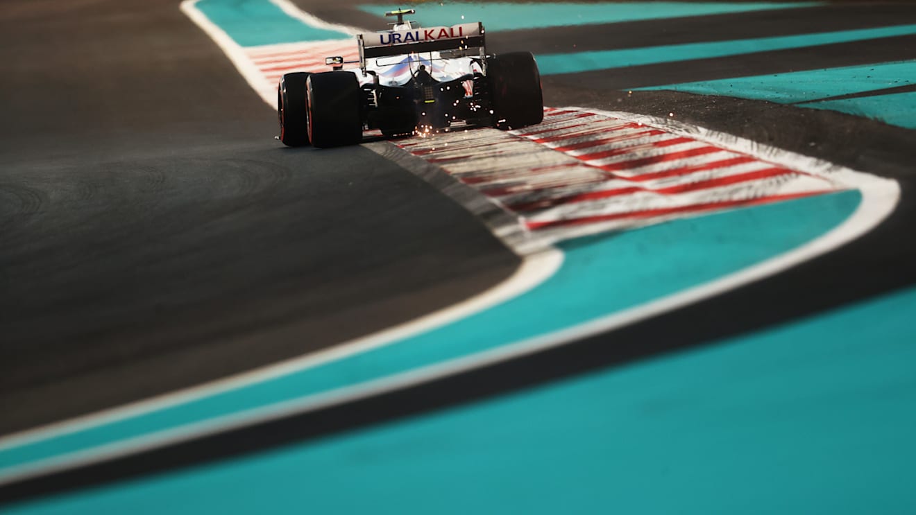 ABU DHABI, UNITED ARAB EMIRATES - DECEMBER 10: Mick Schumacher of Germany driving the (47) Haas F1 Team VF-21 Ferrari during practice ahead of the F1 Grand Prix of Abu Dhabi at Yas Marina Circuit on December 10, 2021 in Abu Dhabi, United Arab Emirates. (Photo by Clive Rose/Getty Images)