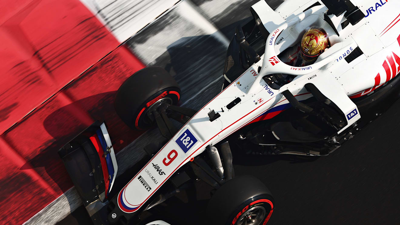 ABU DHABI, UNITED ARAB EMIRATES - DECEMBER 11: Nikita Mazepin of Russia driving the (9) Haas F1 Team VF-21 Ferrari during final practice ahead of the F1 Grand Prix of Abu Dhabi at Yas Marina Circuit on December 11, 2021 in Abu Dhabi, United Arab Emirates. (Photo by Mark Thompson/Getty Images)