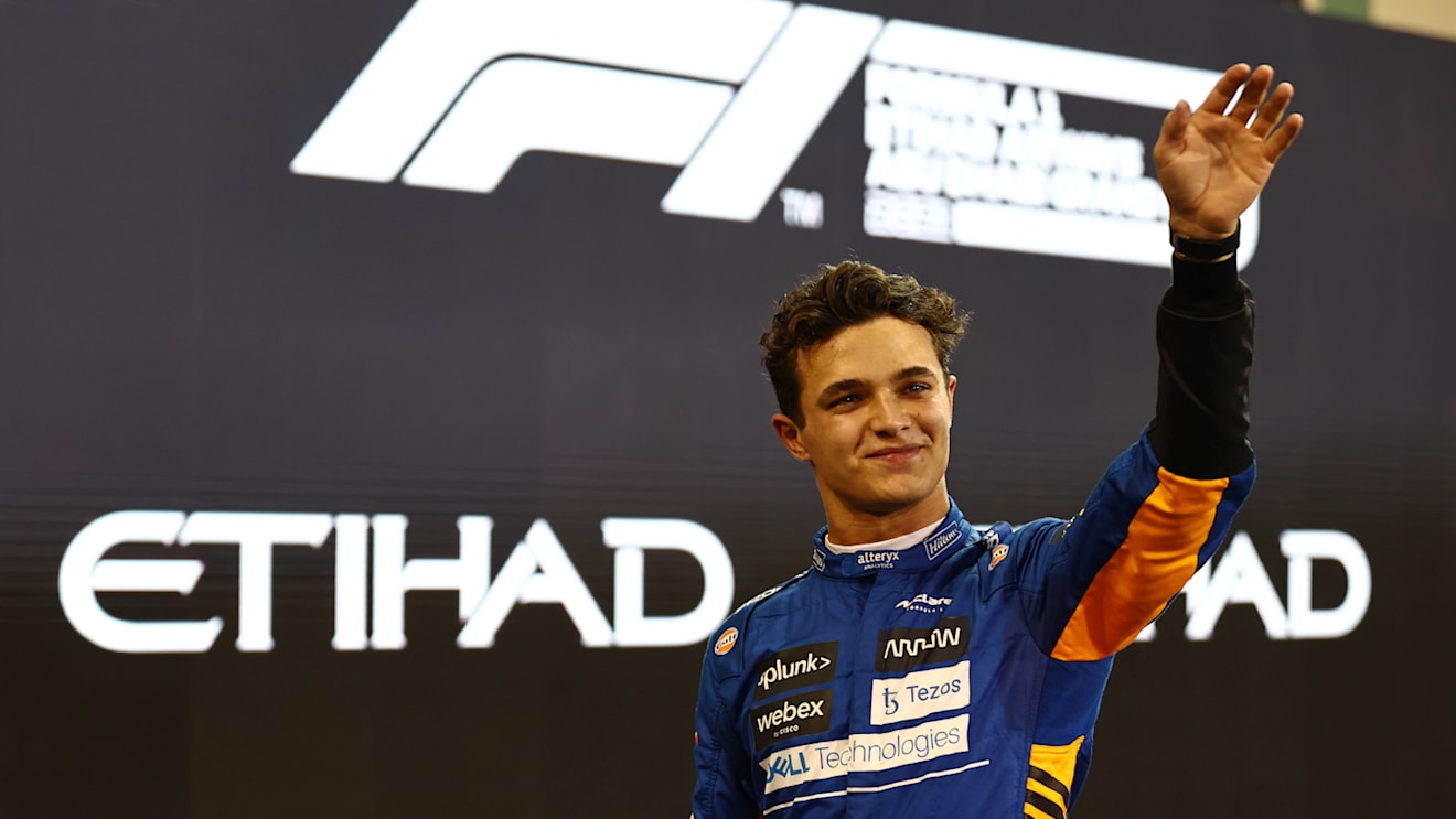 ABU DHABI, UNITED ARAB EMIRATES - DECEMBER 11: Third place qualifier Lando Norris of Great Britain and McLaren F1 celebrates in parc ferme during qualifying ahead of the F1 Grand Prix of Abu Dhabi at Yas Marina Circuit on December 11, 2021 in Abu Dhabi, United Arab Emirates. (Photo by Mark Thompson/Getty Images)