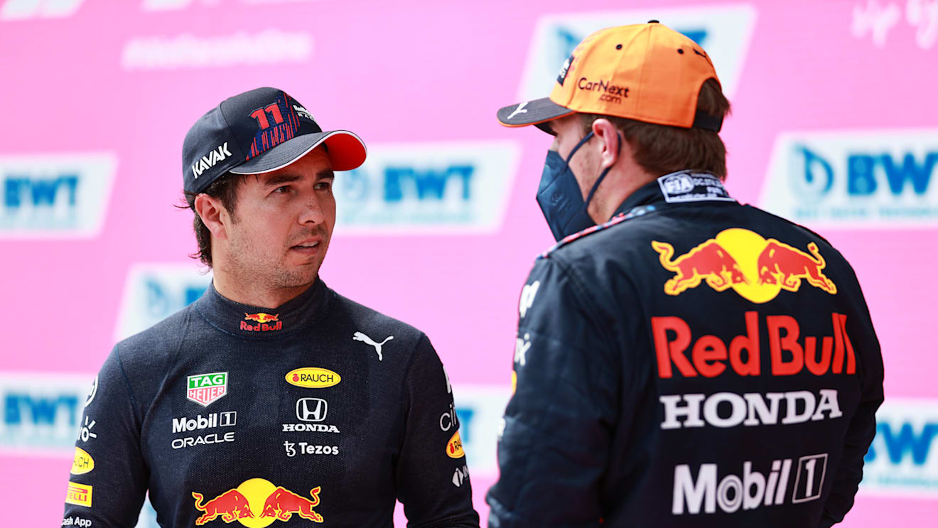 SPIELBERG, AUSTRIA - JULY 03: Pole position qualifier Max Verstappen of Netherlands and Red Bull Racing and third place qualifier Sergio Perez of Mexico and Red Bull Racing celebrate in parc ferme during qualifying ahead of the F1 Grand Prix of Austria at Red Bull Ring on July 03, 2021 in Spielberg, Austria. (Photo by Mark Thompson/Getty Images)