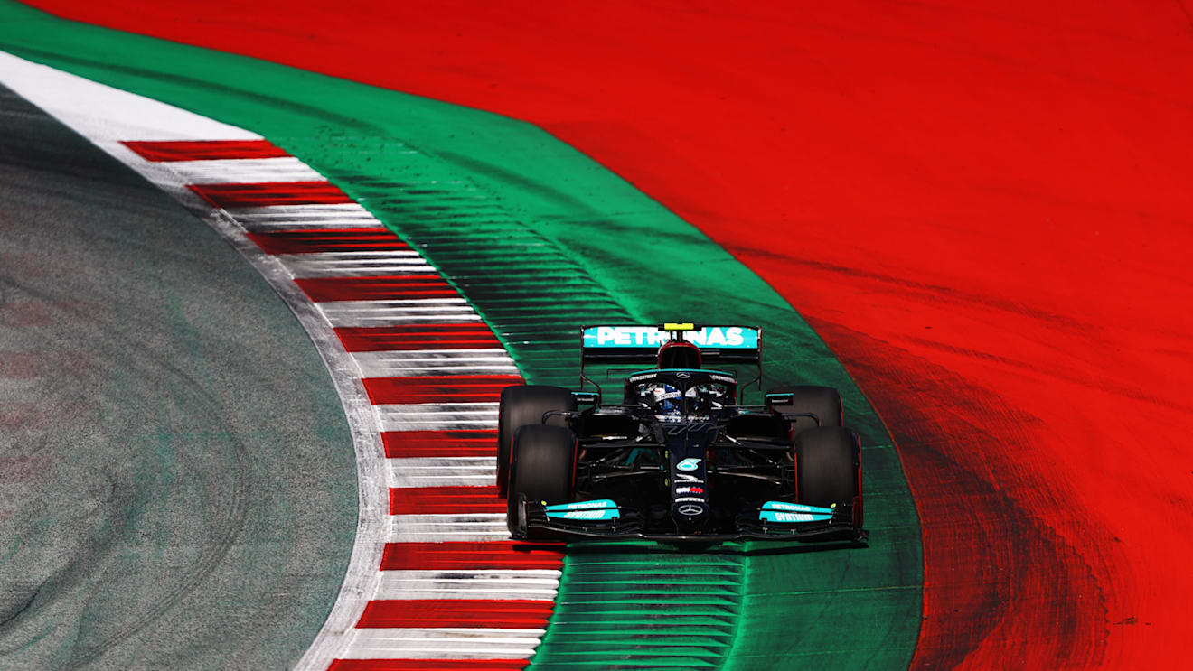SPIELBERG, AUSTRIA - JULY 03: Valtteri Bottas of Finland driving the (77) Mercedes AMG Petronas F1 Team Mercedes W12 during qualifying ahead of the F1 Grand Prix of Austria at Red Bull Ring on July 03, 2021 in Spielberg, Austria. (Photo by Bryn Lennon/Getty Images)