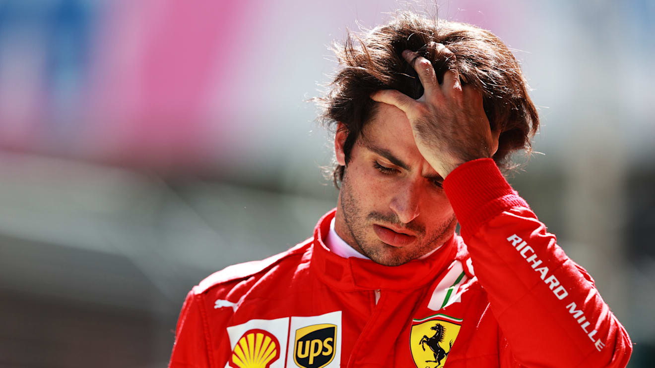 SPIELBERG, AUSTRIA - JULY 03: Carlos Sainz of Spain and Ferrari looks dejected in the Pitlane during qualifying ahead of the F1 Grand Prix of Austria at Red Bull Ring on July 03, 2021 in Spielberg, Austria. (Photo by Mark Thompson/Getty Images)