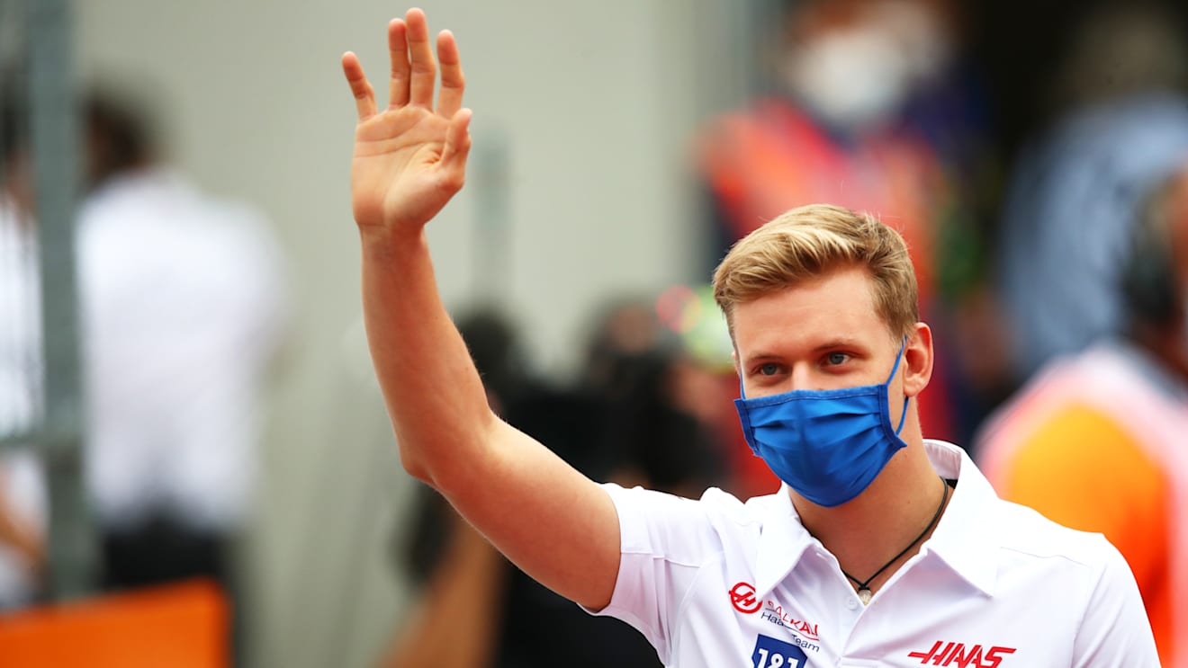 SPIELBERG, AUSTRIA - JULY 04: Mick Schumacher of Germany and Haas F1 waves to the crowd during the drivers parade ahead of the F1 Grand Prix of Austria at Red Bull Ring on July 04, 2021 in Spielberg, Austria. (Photo by Joe Portlock - Formula 1/Formula 1 via Getty Images)