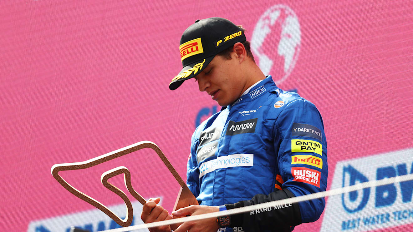 SPIELBERG, AUSTRIA - JULY 04: Third placed Lando Norris of Great Britain and McLaren F1 celebrates on the podium during the F1 Grand Prix of Austria at Red Bull Ring on July 04, 2021 in Spielberg, Austria. (Photo by Clive Rose/Getty Images)