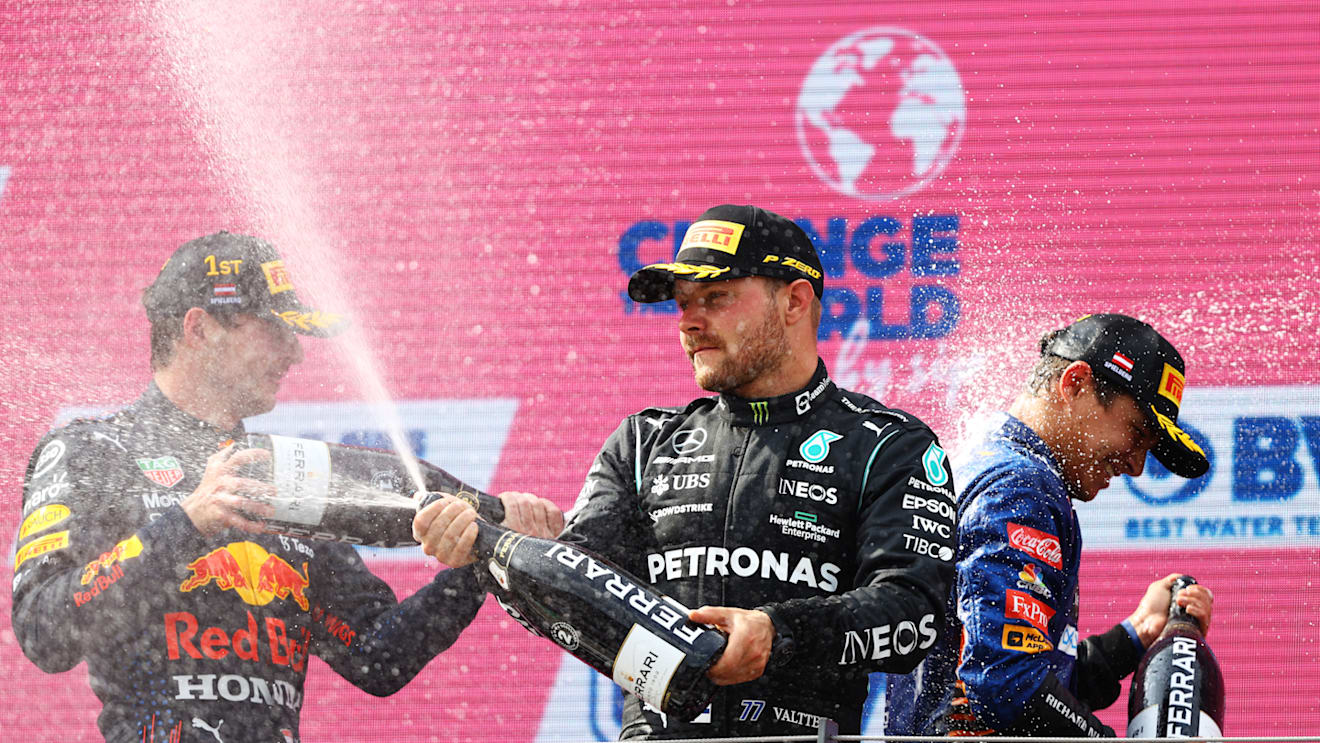 SPIELBERG, AUSTRIA - JULY 04: Second placed Valtteri Bottas of Finland and Mercedes GP celebrates on the podium during the F1 Grand Prix of Austria at Red Bull Ring on July 04, 2021 in Spielberg, Austria. (Photo by Bryn Lennon/Getty Images)
