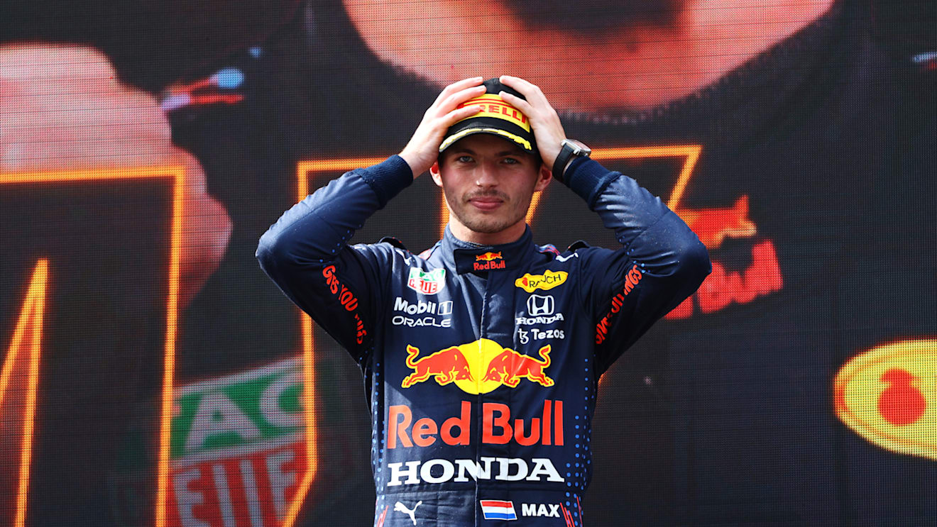 SPIELBERG, AUSTRIA - JULY 04: Race winner Max Verstappen of Netherlands and Red Bull Racing celebrates on the podium during the F1 Grand Prix of Austria at Red Bull Ring on July 04, 2021 in Spielberg, Austria. (Photo by Bryn Lennon/Getty Images)