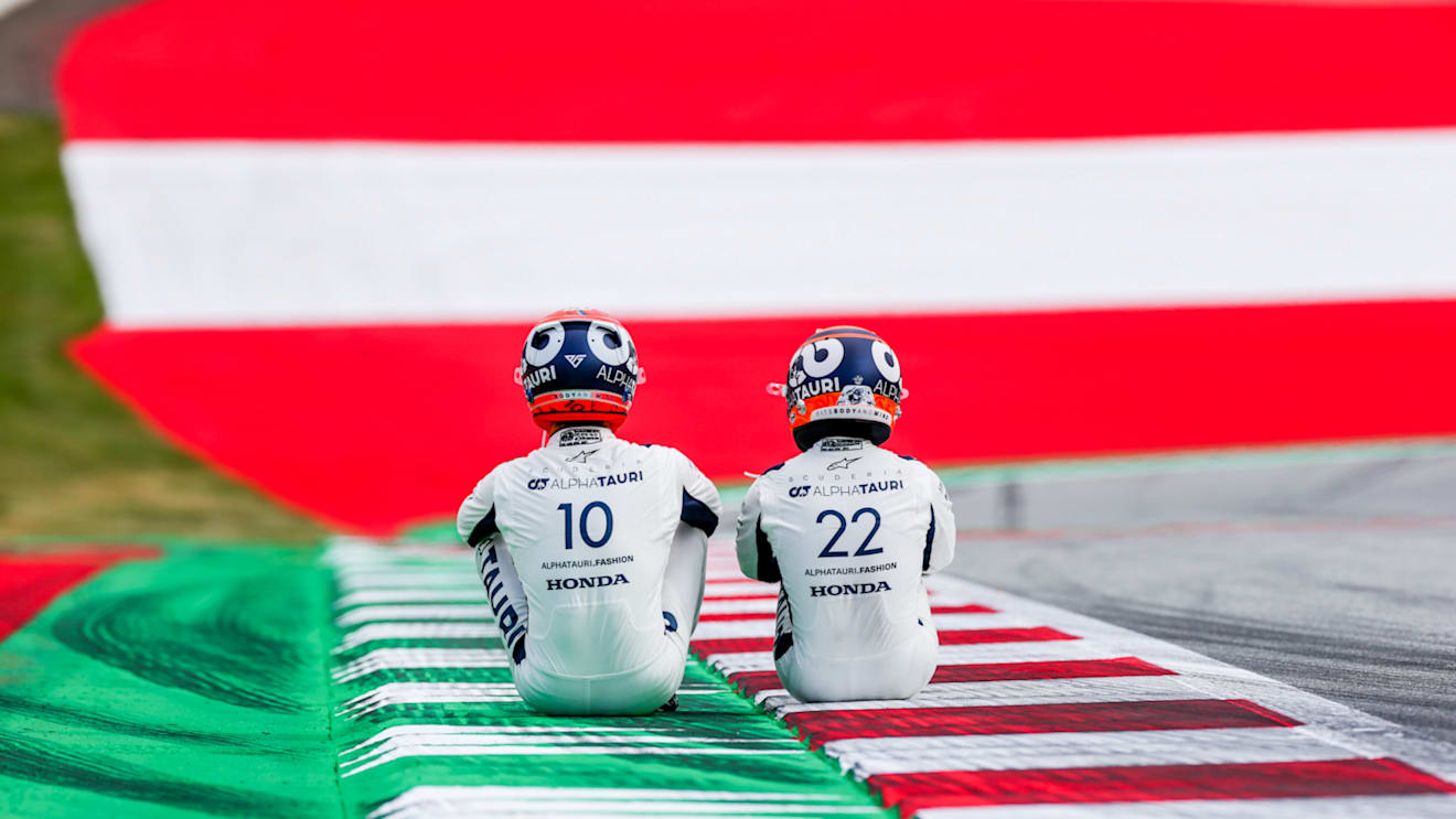 SPIELBERG, AUSTRIA - JULY 01: Pierre Gasly of Scuderia AlphaTauri and France with Yuki Tsunoda of Scuderia AlphaTauri and Japan  during previews ahead of the F1 Grand Prix of Austria at Red Bull Ring on July 01, 2021 in Spielberg, Austria. (Photo by Peter Fox/Getty Images)