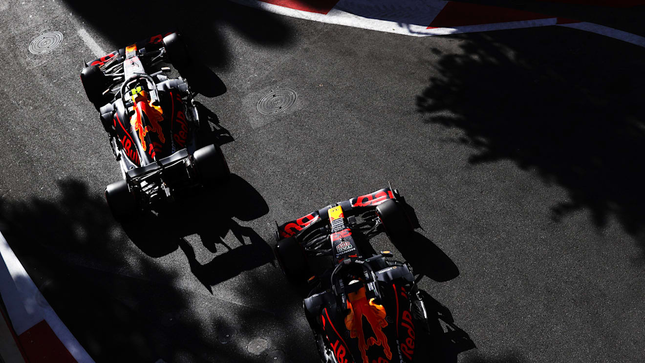BAKU, AZERBAIJAN - JUNE 05: Sergio Perez of Mexico driving the (11) Red Bull Racing RB16B Honda and Max Verstappen of the Netherlands driving the (33) Red Bull Racing RB16B Honda on track during qualifying ahead of the F1 Grand Prix of Azerbaijan at Baku City Circuit on June 05, 2021 in Baku, Azerbaijan. (Photo by Clive Rose/Getty Images)