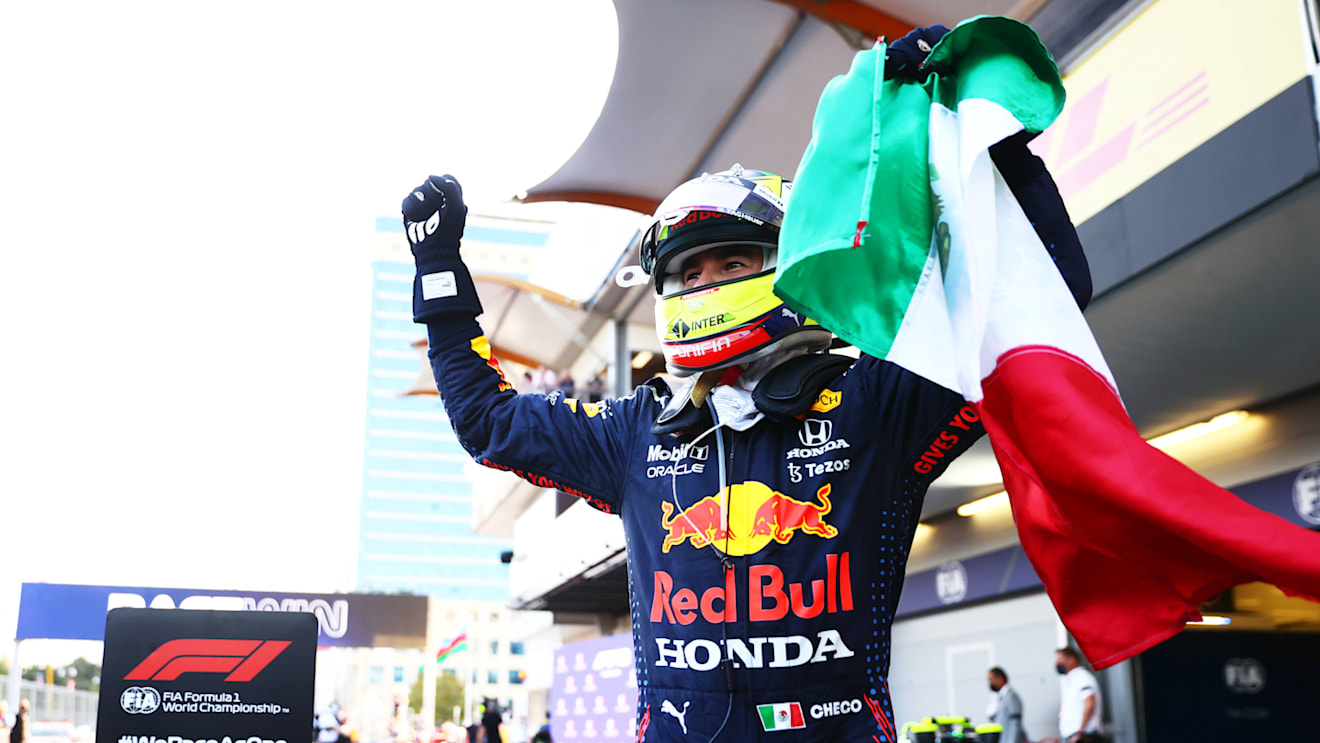 BAKU, AZERBAIJAN - JUNE 06: Race winner Sergio Perez of Mexico and Red Bull Racing celebrates in parc ferme during the F1 Grand Prix of Azerbaijan at Baku City Circuit on June 06, 2021 in Baku, Azerbaijan. (Photo by Dan Istitene - Formula 1/Formula 1 via Getty Images)