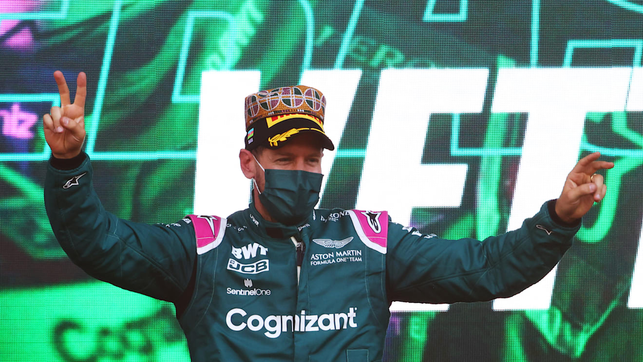 BAKU, AZERBAIJAN - JUNE 06: Second placed Sebastian Vettel of Germany and Aston Martin F1 Team celebrates on the podium during the F1 Grand Prix of Azerbaijan at Baku City Circuit on June 06, 2021 in Baku, Azerbaijan. (Photo by Francois Nel/Getty Images)
