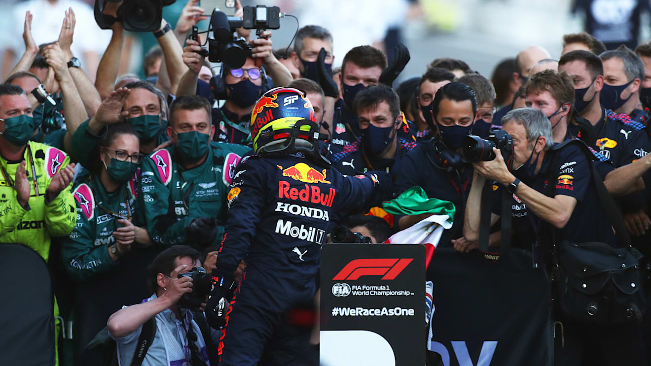 BAKU, AZERBAIJAN - JUNE 06: Race winner Sergio Perez of Mexico and Red Bull Racing celebrates in parc ferme during the F1 Grand Prix of Azerbaijan at Baku City Circuit on June 06, 2021 in Baku, Azerbaijan. (Photo by Joe Portlock - Formula 1/Formula 1 via Getty Images)