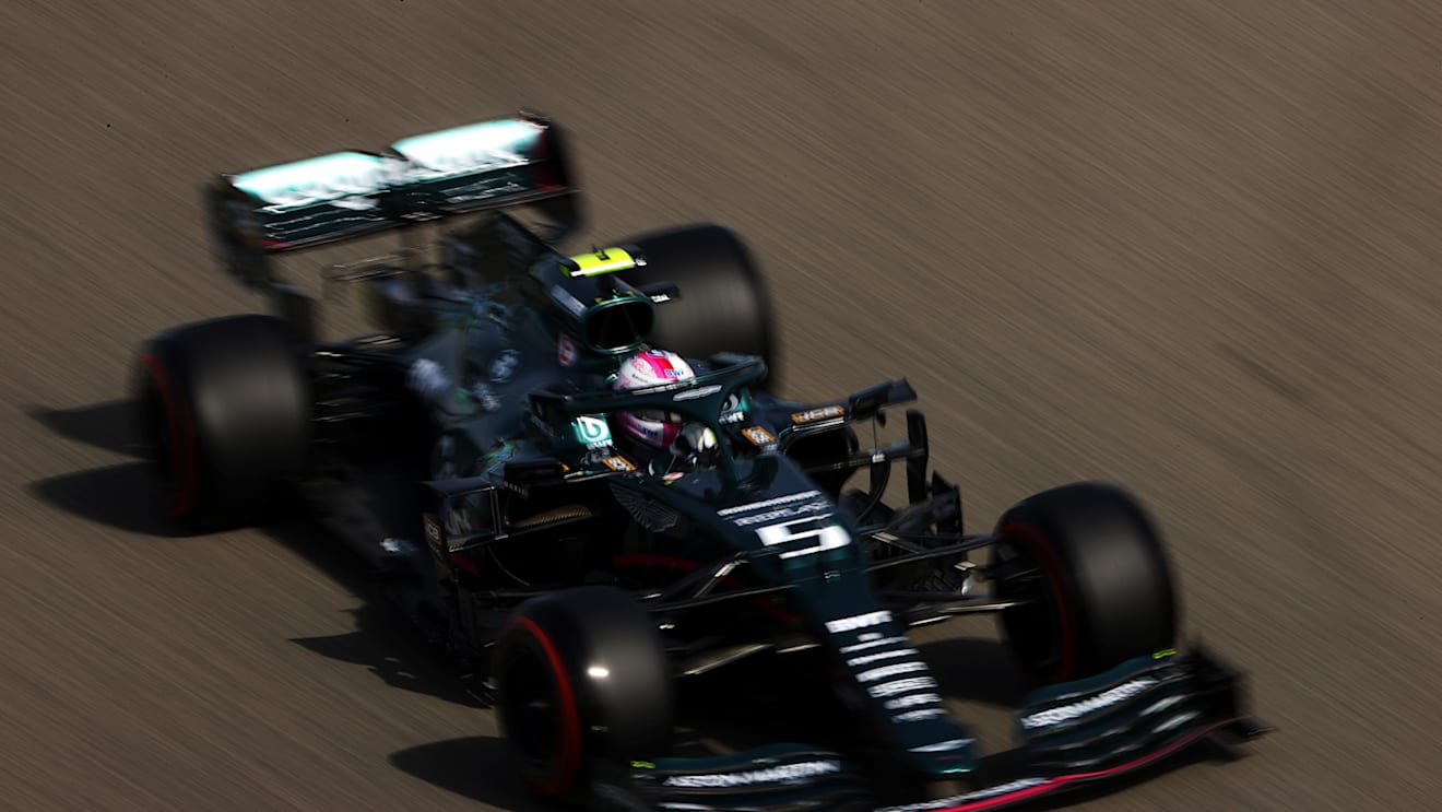 BAHRAIN, BAHRAIN - MARCH 26: Sebastian Vettel of Germany driving the (5) Aston Martin AMR21 Mercedes drives on track during practice ahead of the F1 Grand Prix of Bahrain at Bahrain International Circuit on March 26, 2021 in Bahrain, Bahrain. (Photo by Bryn Lennon/Getty Images)