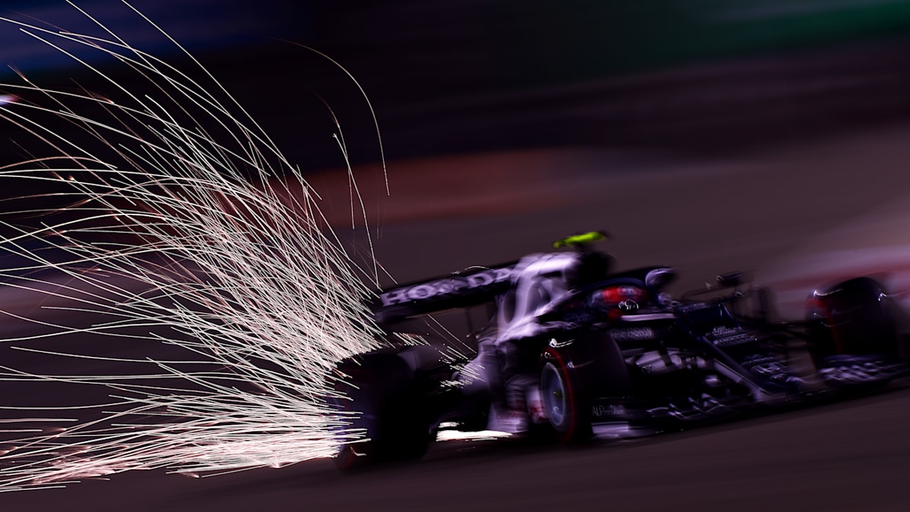 BAHRAIN, BAHRAIN - MARCH 26: Sparks fly behind Pierre Gasly of France driving the (10) Scuderia AlphaTauri AT02 Honda on track during practice ahead of the F1 Grand Prix of Bahrain at Bahrain International Circuit on March 26, 2021 in Bahrain, Bahrain. (Photo by Mario Renzi - Formula 1/Formula 1 via Getty Images)