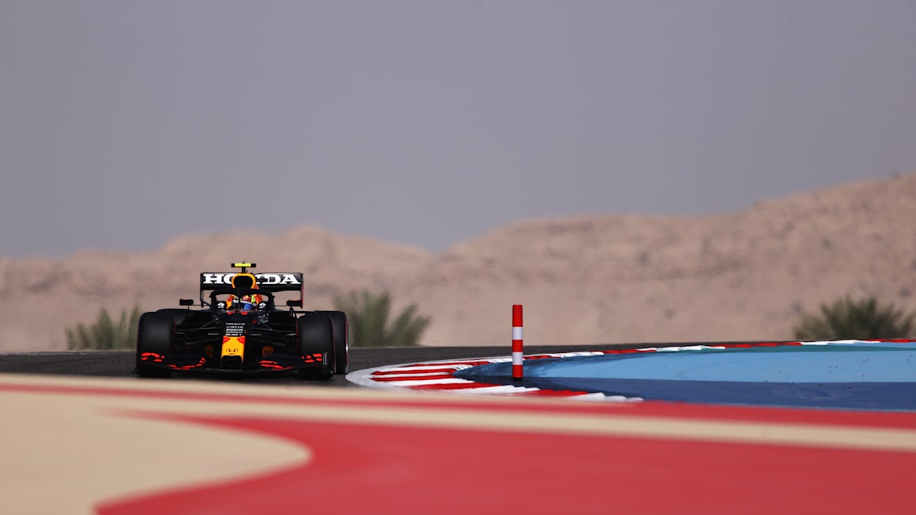 BAHRAIN, BAHRAIN - MARCH 26: Sergio Perez of Mexico driving the (11) Red Bull Racing RB16B Honda on track during practice ahead of the F1 Grand Prix of Bahrain at Bahrain International Circuit on March 26, 2021 in Bahrain, Bahrain. (Photo by Lars Baron/Getty Images)