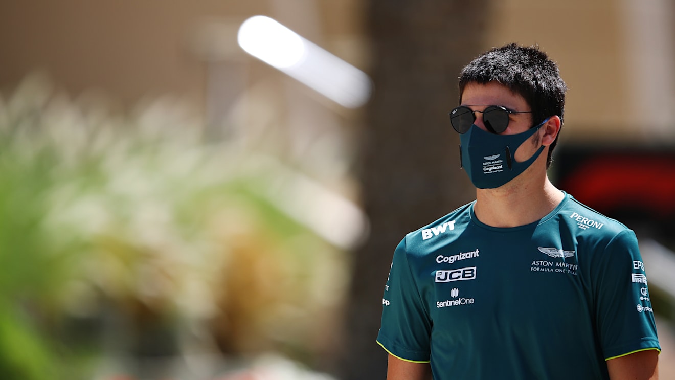 BAHRAIN, BAHRAIN - MARCH 27: Lance Stroll of Canada and Aston Martin F1 Team walks in the Paddock before final practice ahead of the F1 Grand Prix of Bahrain at Bahrain International Circuit on March 27, 2021 in Bahrain, Bahrain. (Photo by Mark Thompson/Getty Images)