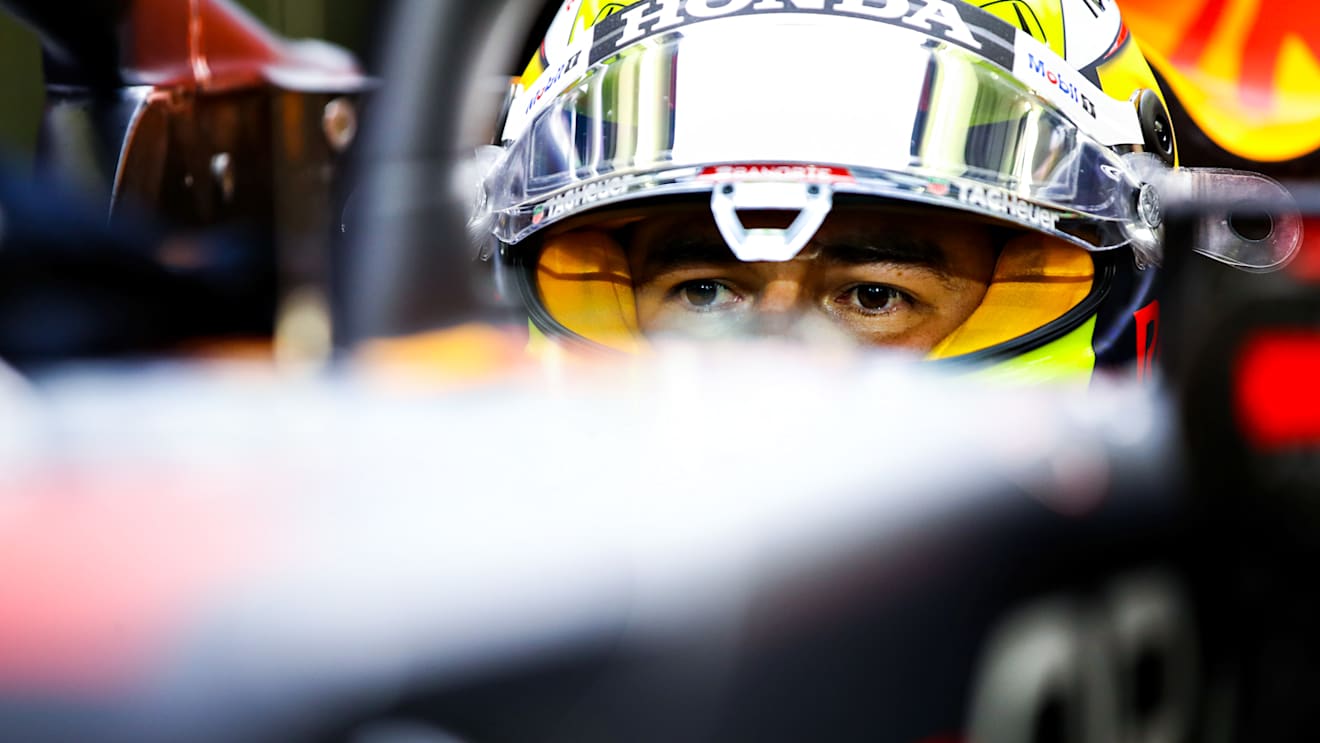 BAHRAIN, BAHRAIN - MARCH 27: Sergio Perez of Mexico and Red Bull Racing prepares to drive in the garage during qualifying ahead of the F1 Grand Prix of Bahrain at Bahrain International Circuit on March 27, 2021 in Bahrain, Bahrain. (Photo by Mark Thompson/Getty Images)