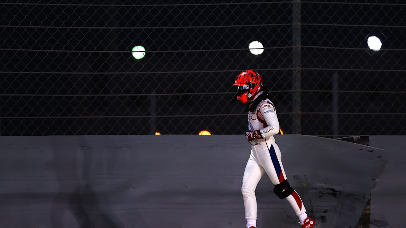 BAHRAIN, BAHRAIN - MARCH 28: Nikita Mazepin of Russia and Haas F1 makes his way off the circuit after stopping on track during the F1 Grand Prix of Bahrain at Bahrain International Circuit on March 28, 2021 in Bahrain, Bahrain. (Photo by Lars Baron/Getty Images)