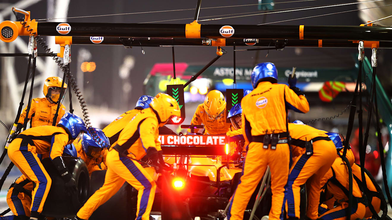 BAHRAIN, BAHRAIN - MARCH 28: Daniel Ricciardo of Australia driving the (3) McLaren F1 Team MCL35M Mercedes makes a pitstop during the F1 Grand Prix of Bahrain at Bahrain International Circuit on March 28, 2021 in Bahrain, Bahrain. (Photo by Mark Thompson/Getty Images)