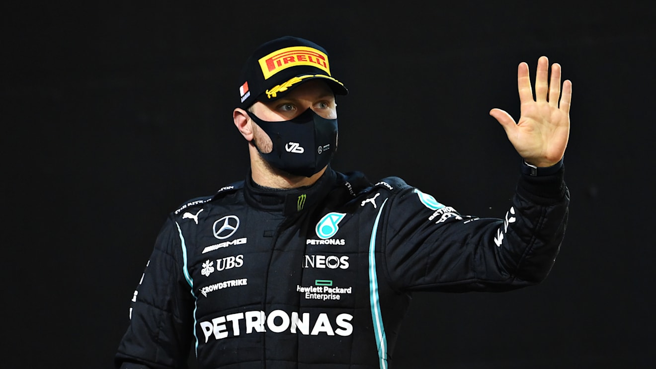 BAHRAIN, BAHRAIN - MARCH 28: Third placed Valtteri Bottas of Finland and Mercedes GP celebrates on the podium during the F1 Grand Prix of Bahrain at Bahrain International Circuit on March 28, 2021 in Bahrain, Bahrain. (Photo by Clive Mason - Formula 1/Formula 1 via Getty Images)