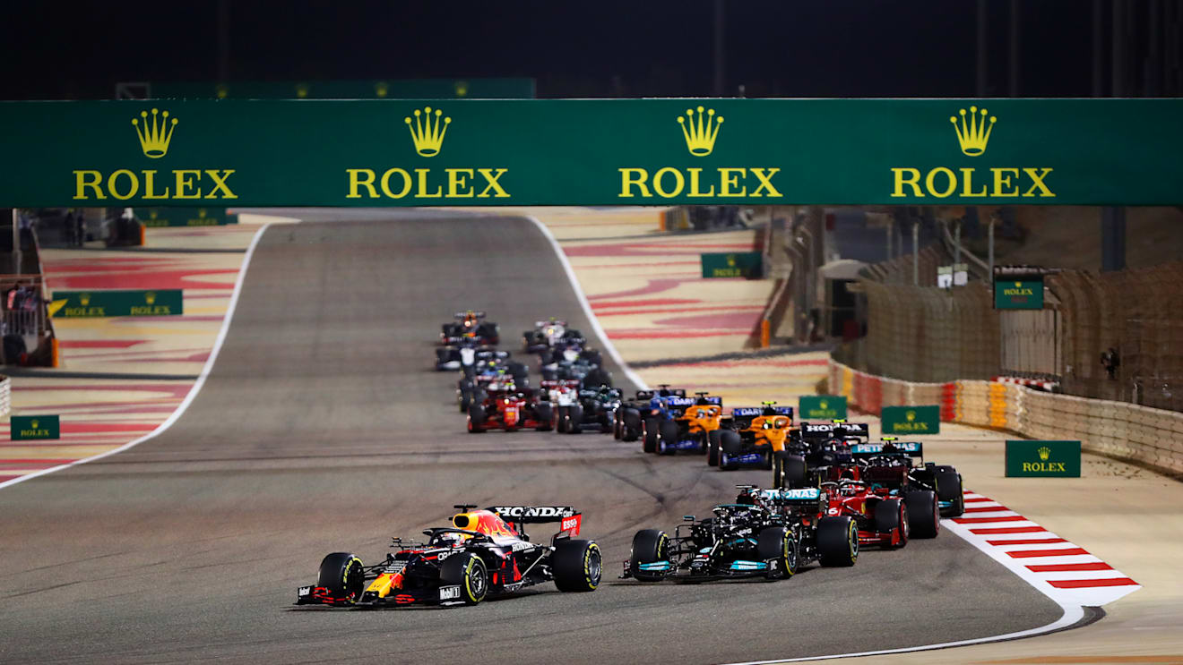 BAHRAIN, BAHRAIN - MARCH 28:  Max Verstappen of the Netherlands driving the (33) Red Bull Racing RB16B Honda leads Lewis Hamilton of Great Britain driving the (44) Mercedes AMG Petronas F1 Team Mercedes W12 and Charles Leclerc of Monaco driving the (16) Scuderia Ferrari SF21  during the F1 Grand Prix of Bahrain at Bahrain International Circuit on March 28, 2021 in Bahrain, Bahrain. (Photo by Dan Istitene - Formula 1/Formula 1 via Getty Images)