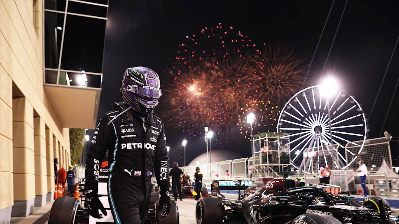 BAHRAIN, BAHRAIN - MARCH 28: Race winner Lewis Hamilton of Great Britain and Mercedes GP looks on in parc ferme during the F1 Grand Prix of Bahrain at Bahrain International Circuit on March 28, 2021 in Bahrain, Bahrain. (Photo by Lars Baron/Getty Images)