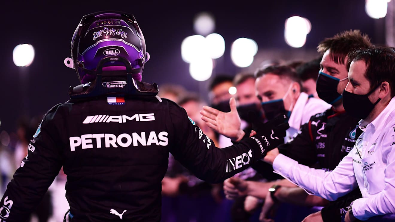 BAHRAIN, BAHRAIN - MARCH 28: Race winner Lewis Hamilton of Great Britain and Mercedes GP celebrates in parc ferme during the F1 Grand Prix of Bahrain at Bahrain International Circuit on March 28, 2021 in Bahrain, Bahrain. (Photo by Mario Renzi - Formula 1/Formula 1 via Getty Images)