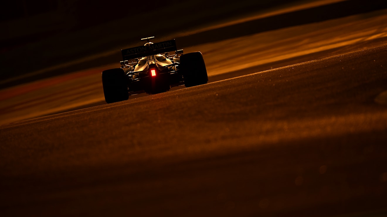 BAHRAIN, BAHRAIN - MARCH 28: Sebastian Vettel of Germany driving the (5) Aston Martin AMR21 Mercedes  on his way to the grid prior to the F1 Grand Prix of Bahrain at Bahrain International Circuit on March 28, 2021 in Bahrain, Bahrain. (Photo by Clive Mason - Formula 1/Formula 1 via Getty Images)