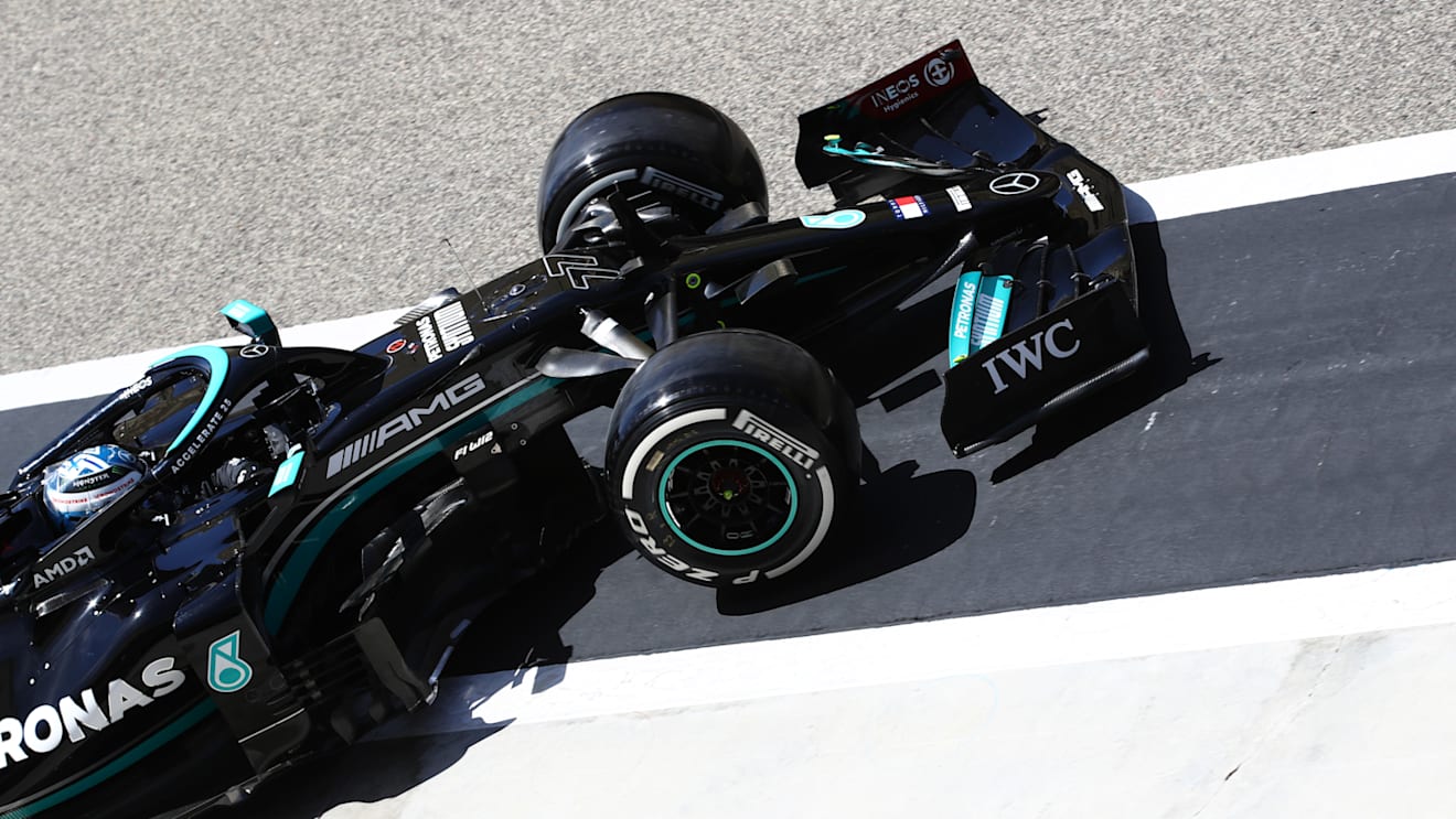 Bottas pulls out of hit garage ready for another run